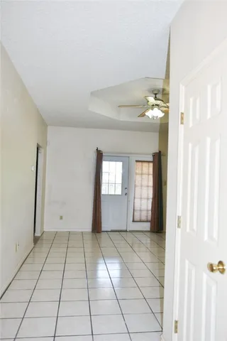 a view of an empty room and window