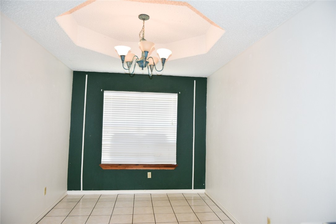305 Hickory Bishop, TX 78343 - Photo 12 of 23 a view of an empty room with a window