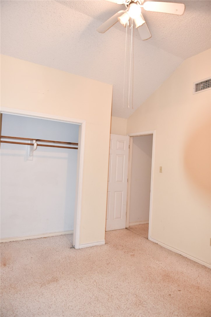 305 Hickory Bishop, TX 78343 - Photo 16 of 23 a view of a room with a ceiling fan