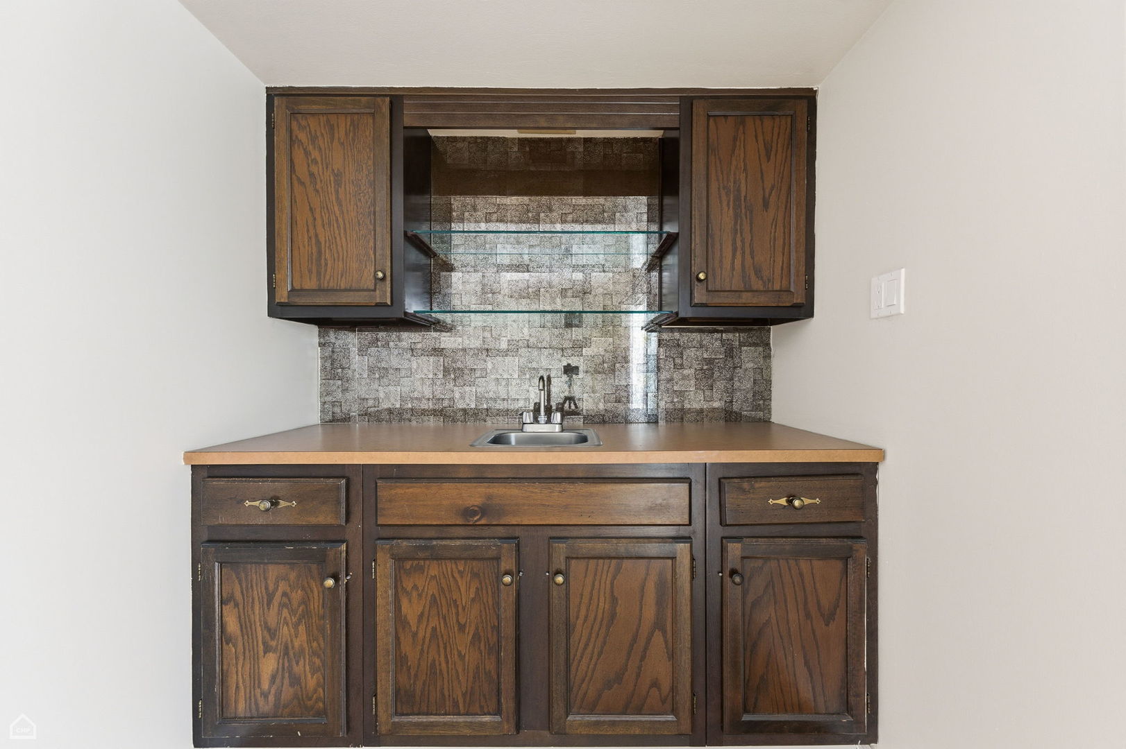 1081 Pinehurst Lane Schaumburg, IL 60193 - Photo 11 of 26 a sink with a cabinets