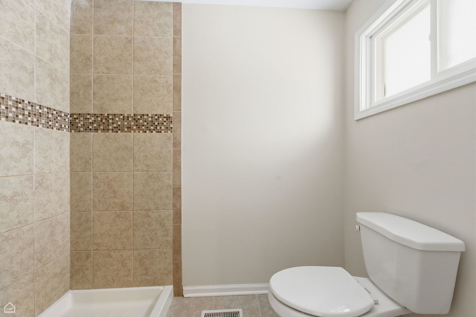 1081 Pinehurst Lane Schaumburg, IL 60193 - Photo 21 of 26 a white toilet sitting next to a bathroom sink