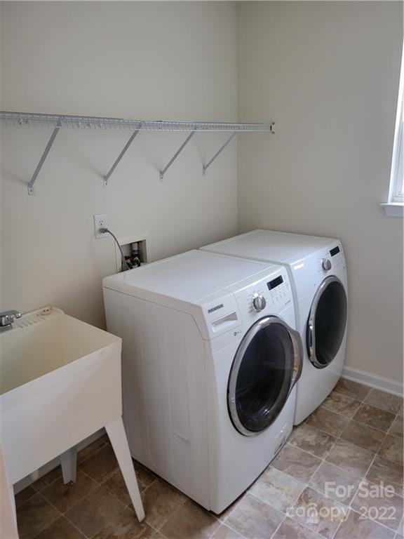 2449 Smith Cove Road Denver, NC 28037 - Photo 16 of 18 a utility room with dryer and washer