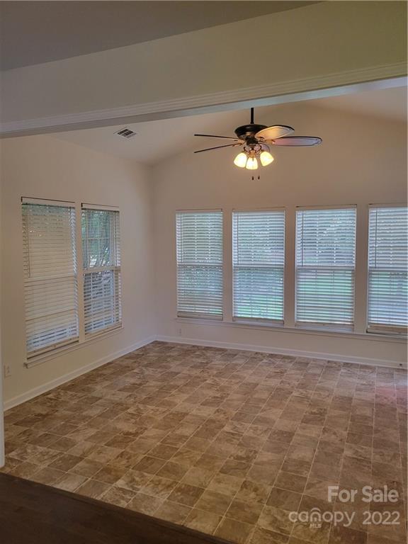 2449 Smith Cove Road Denver, NC 28037 - Photo 8 of 18 a view of an empty room with a window