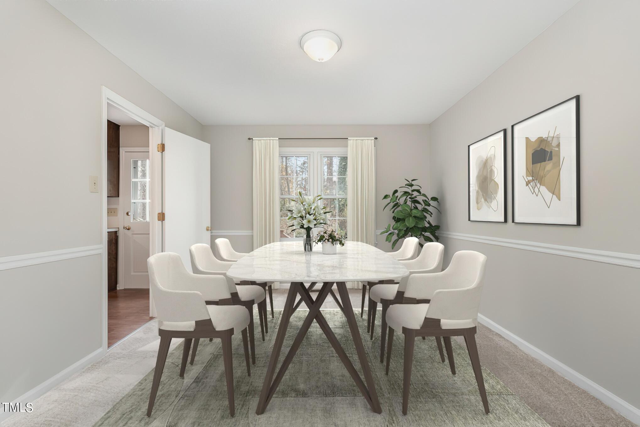 3703 Sandy Ridge Lane Durham, NC 27705 - Photo 11 of 36 a view of a dining room with furniture and window