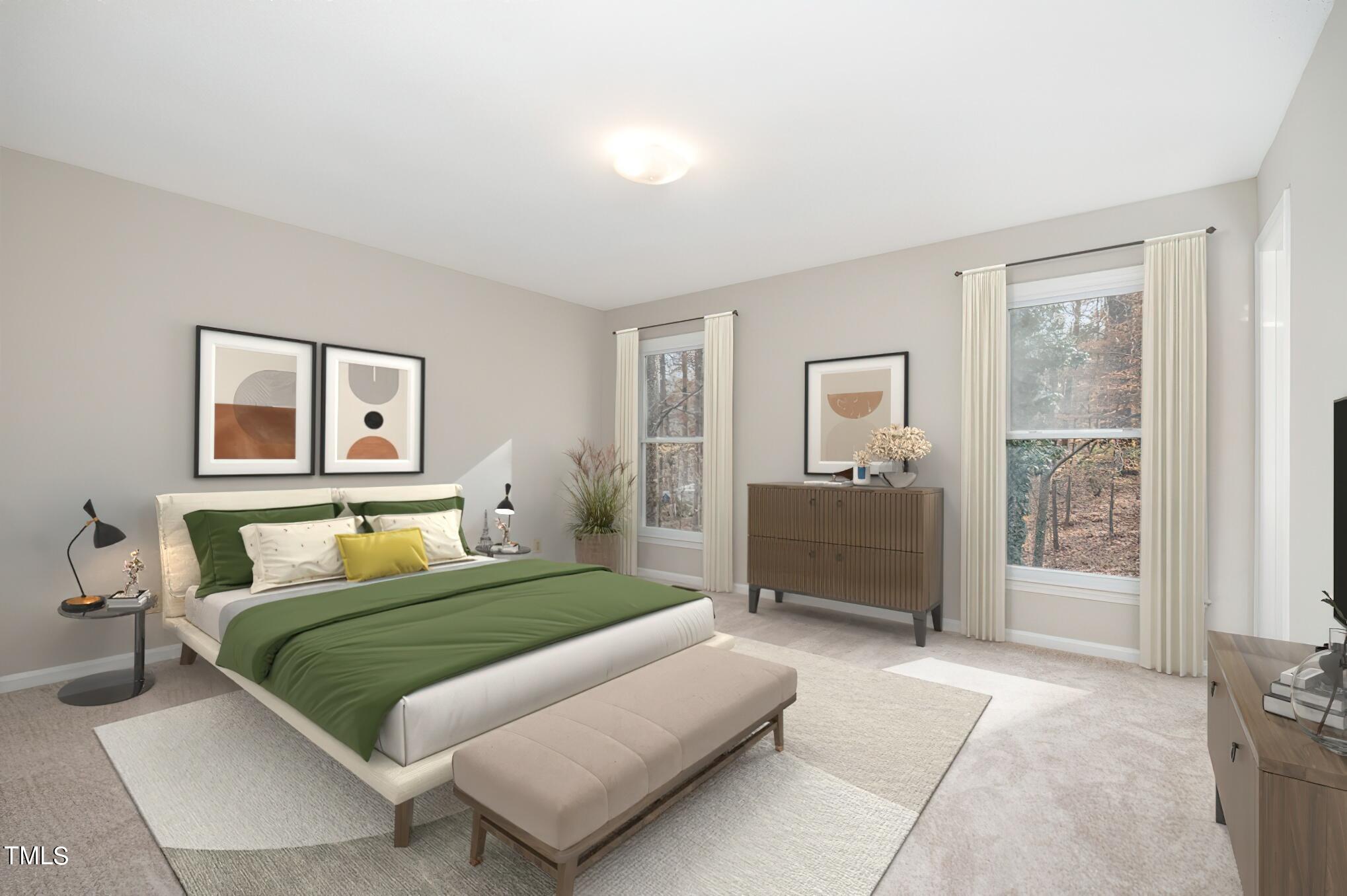 3703 Sandy Ridge Lane Durham, NC 27705 - Photo 18 of 36 a bedroom with a bed and a view of bathroom