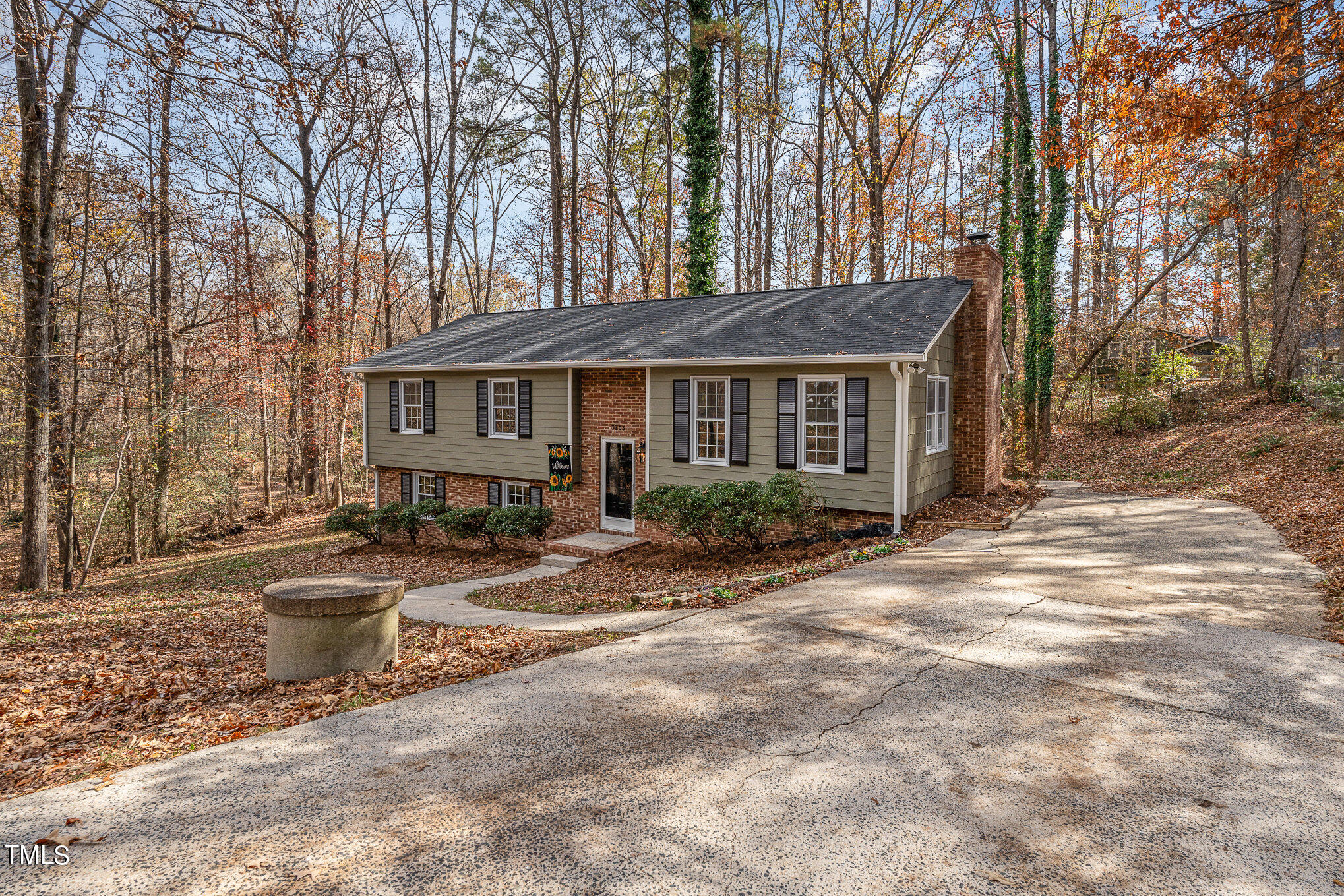 3703 Sandy Ridge Lane Durham, NC 27705 - Photo 2 of 36 a front view of a house with a yard