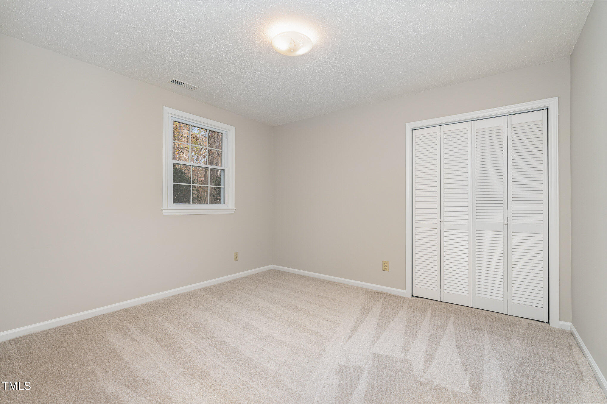 3703 Sandy Ridge Lane Durham, NC 27705 - Photo 22 of 36 an empty room with windows