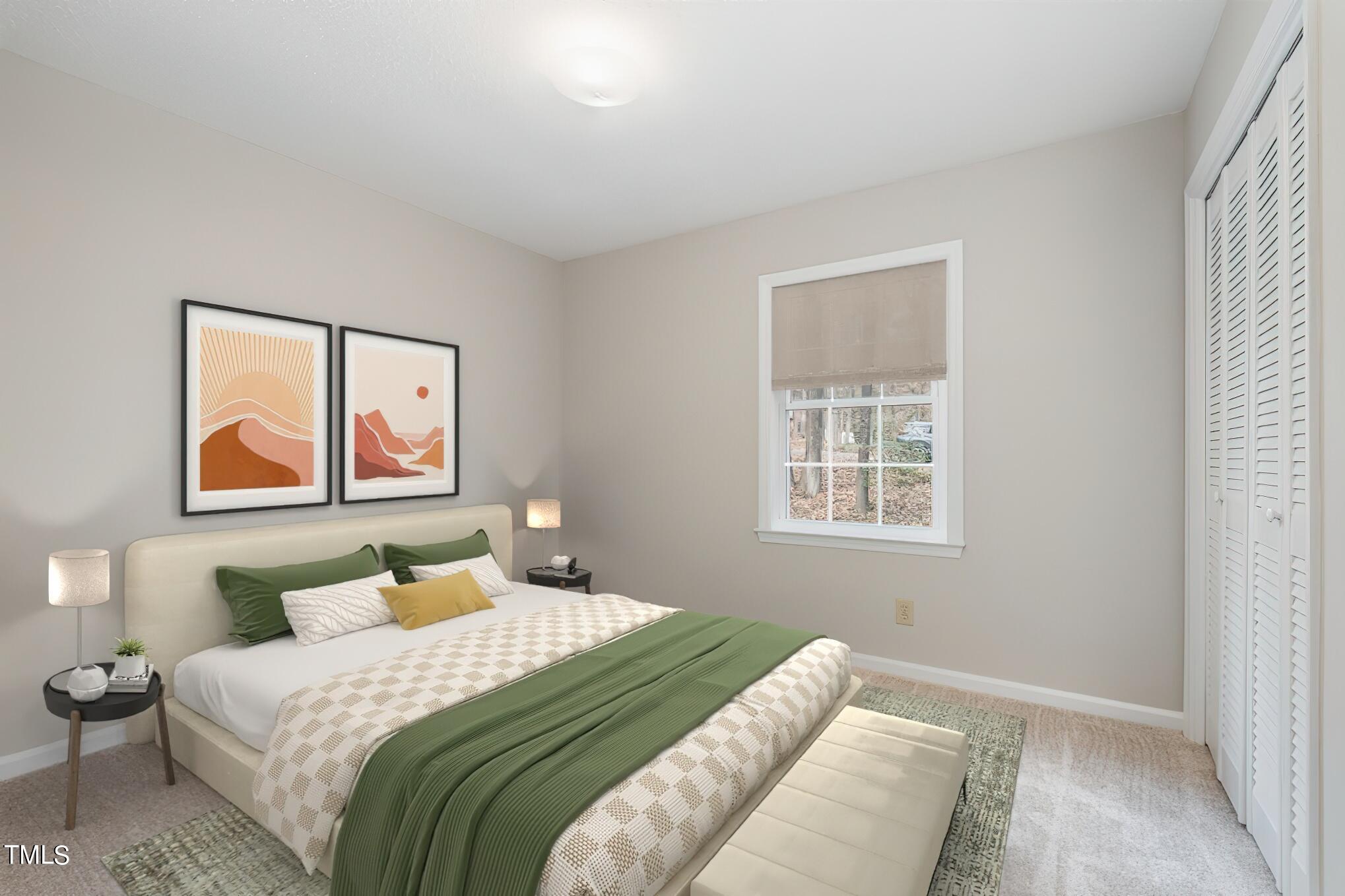 3703 Sandy Ridge Lane Durham, NC 27705 - Photo 24 of 36 a bedroom with a bed and a window