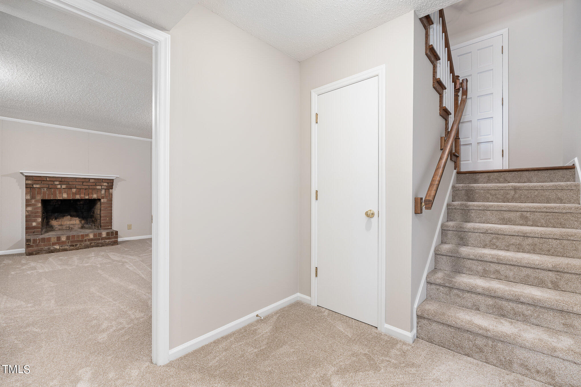 3703 Sandy Ridge Lane Durham, NC 27705 - Photo 26 of 36 a view of an entryway with staircase