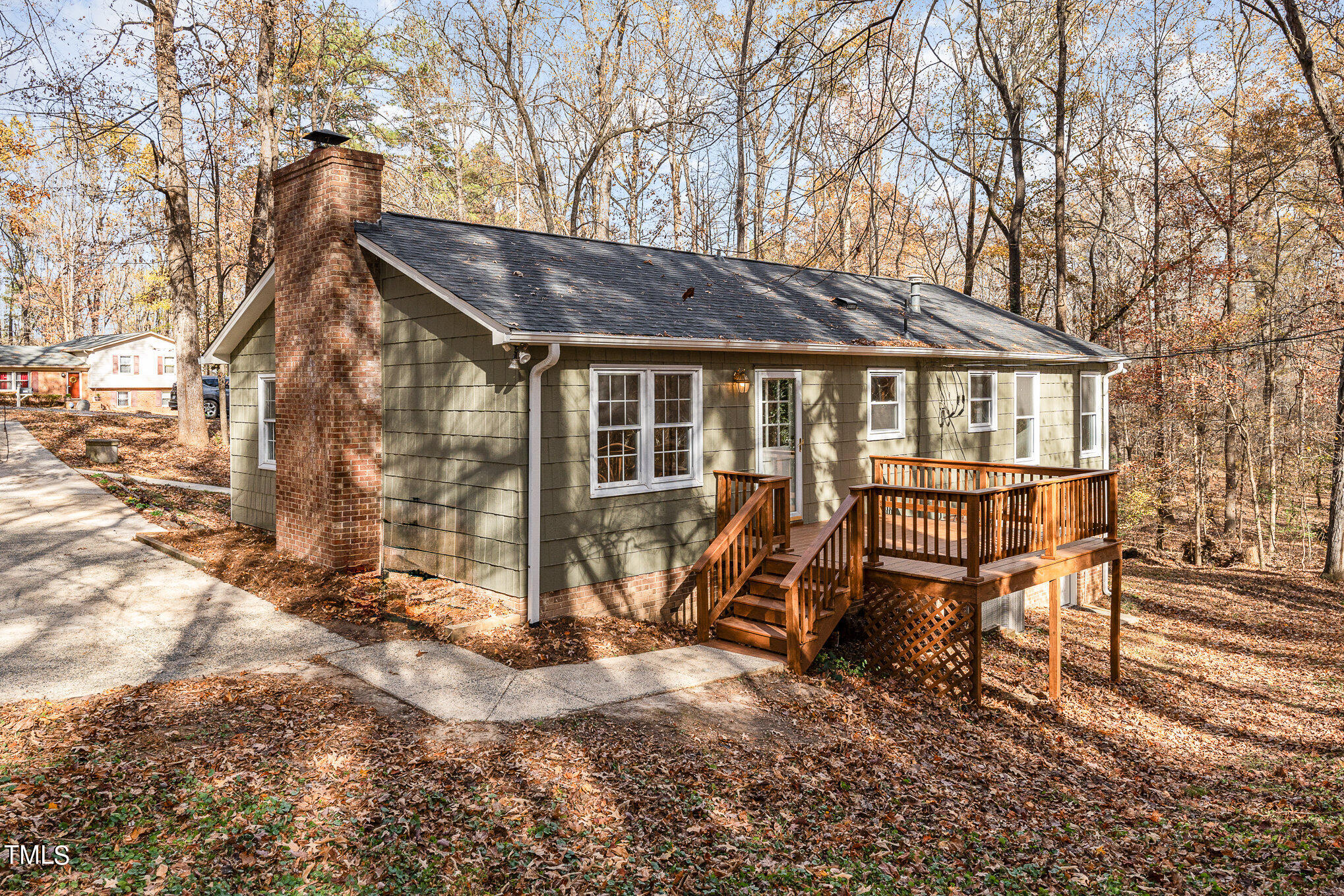 3703 Sandy Ridge Lane Durham, NC 27705 - Photo 33 of 36 a view of a house with backyard porch and sitting area