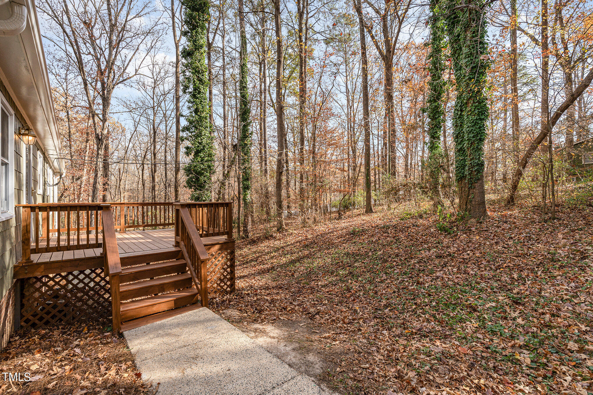 3703 Sandy Ridge Lane Durham, NC 27705 - Photo 35 of 36 a view of outdoor space with deck and tree