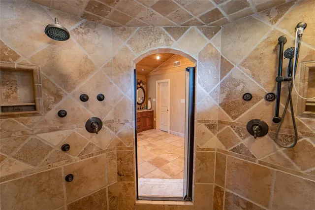 a bathroom with a sink and mirror
