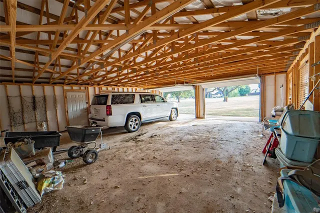 an aerial view of house with yard