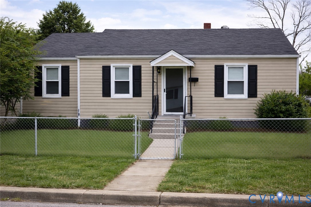 129 Seaboard Street Petersburg, VA 23803 - Photo 1 of 21 a view of a house with a yard
