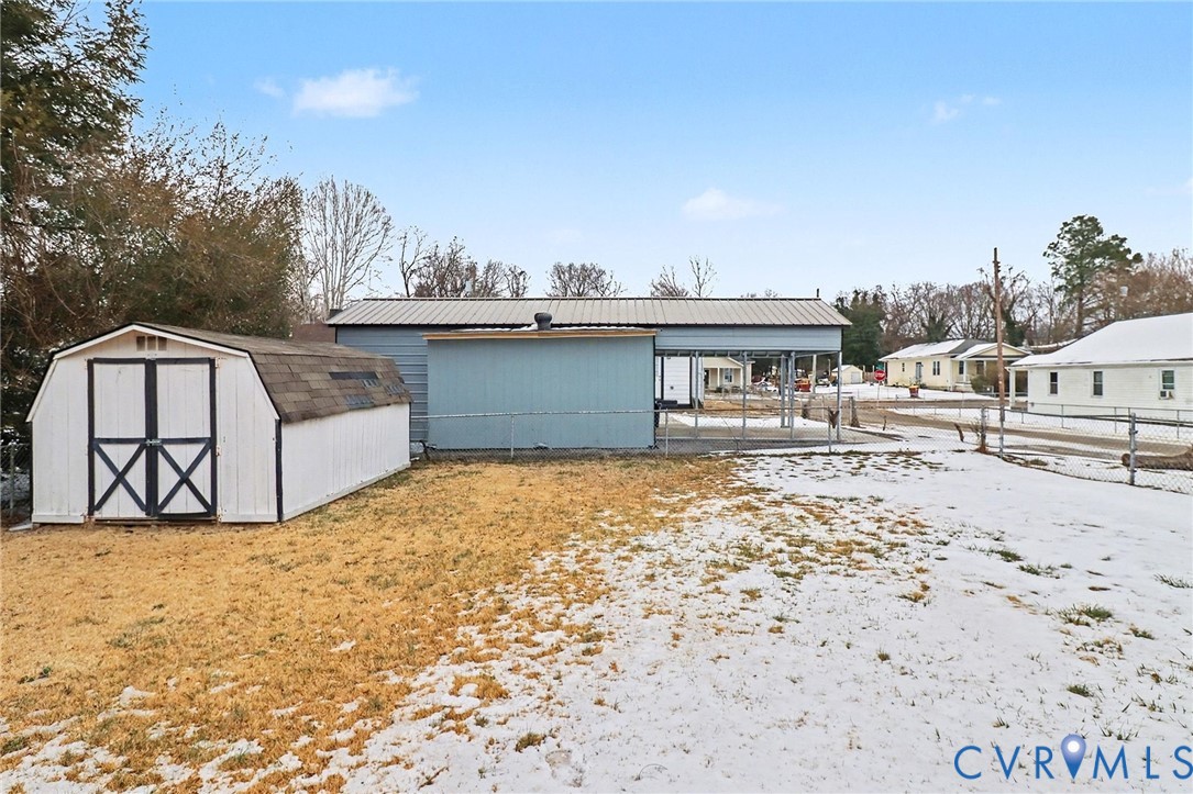 129 Seaboard Street Petersburg, VA 23803 - Photo 21 of 21 a view of a wooden house with a outdoor space