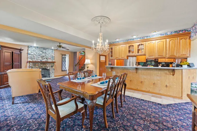 a view of a dining room with furniture window and outside view