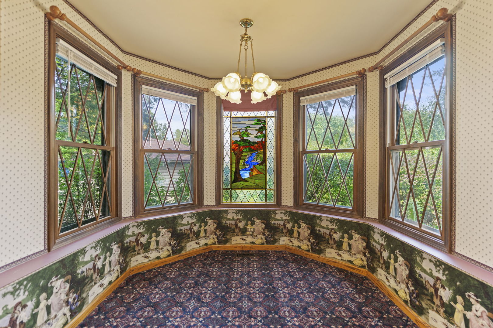 4511 Hanover Drive Crystal Lake, IL 60012 - Photo 15 of 68 a view of a room with a large bed and a chandelier
