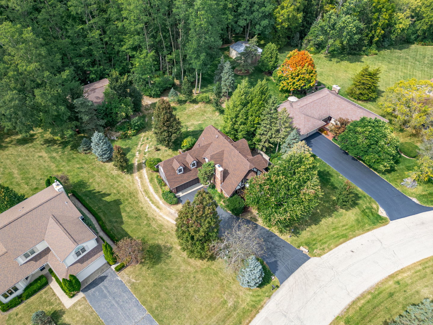 4511 Hanover Drive Crystal Lake, IL 60012 - Photo 3 of 68 an aerial view of a house with a yard and lake view