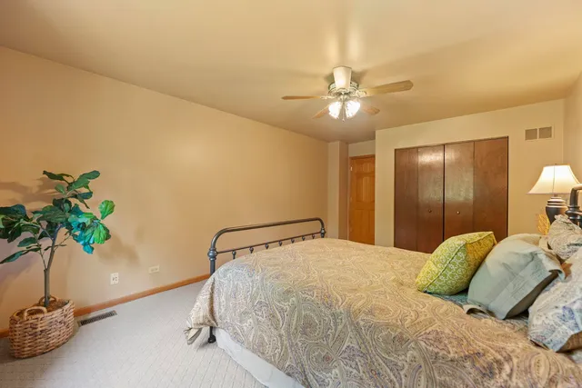 a bathroom with a toilet a sink and a shower