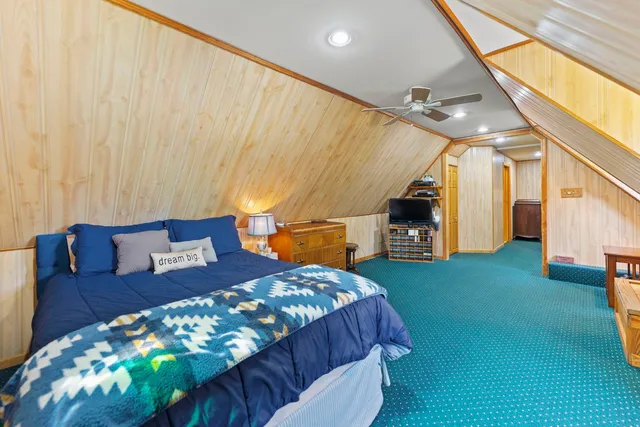 a view of parking garage with cars