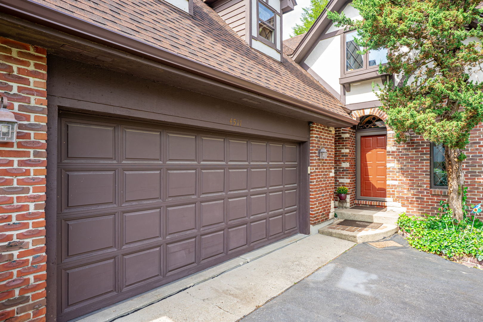 4511 Hanover Drive Crystal Lake, IL 60012 - Photo 10 of 68 a front view of a house with a garage