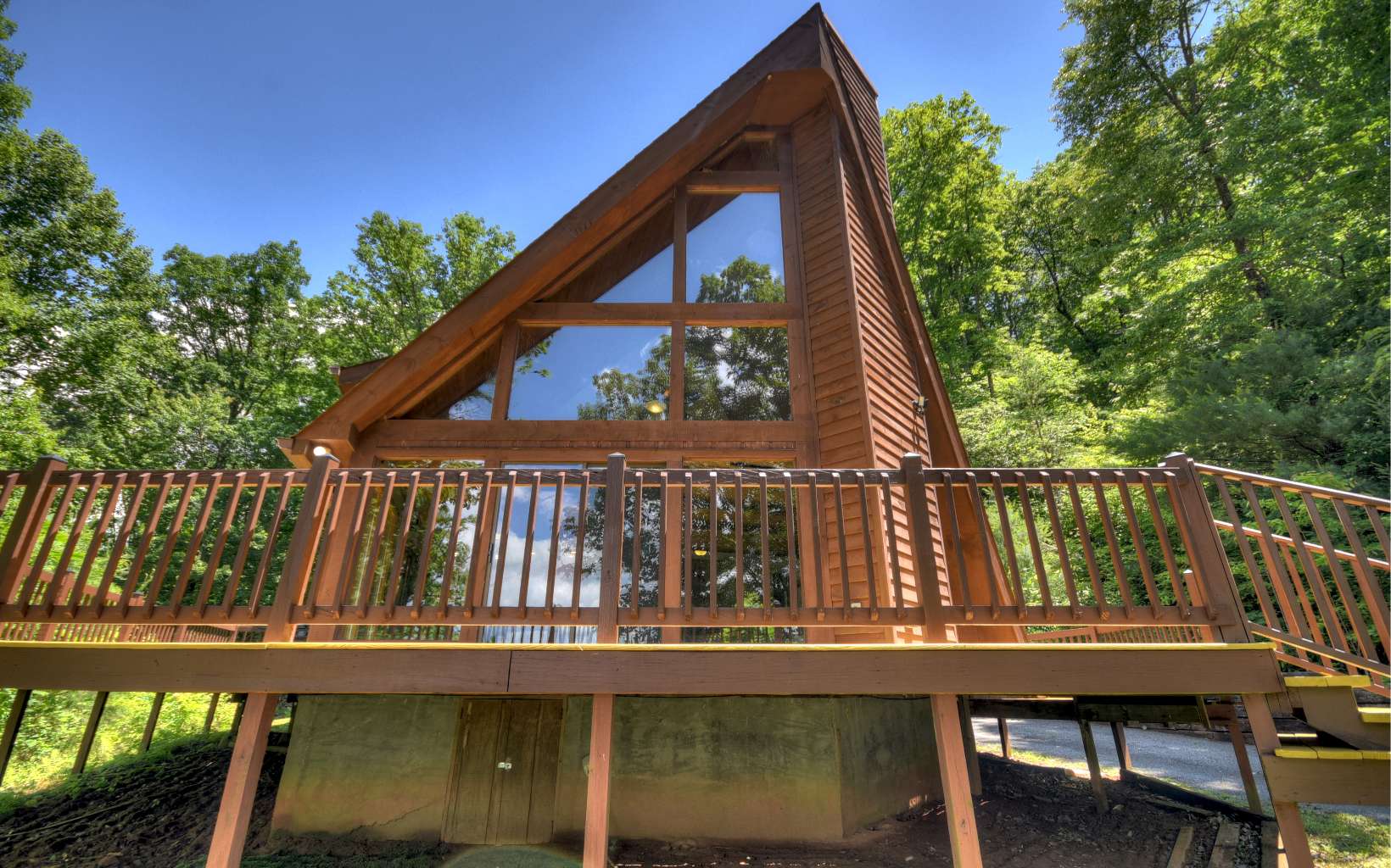 742 Sassafras Ridge Road Turtletown, TN 37391 - Photo 3 of 4 a view of house with a large window and outdoor seating