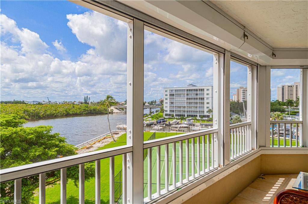25 Bluebill Avenue, Unit 301 Naples, FL 34108 - Photo 11 of 41 a view of a city from a balcony