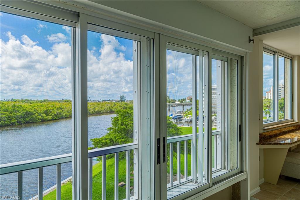 25 Bluebill Avenue, Unit 301 Naples, FL 34108 - Photo 23 of 41 a view of a room with a large window
