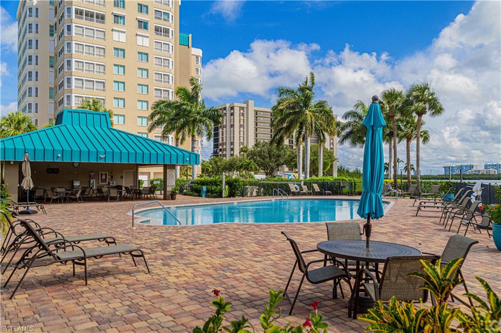 25 Bluebill Avenue, Unit 301 Naples, FL 34108 - Photo 31 of 41 a view of outdoor space yard and patio