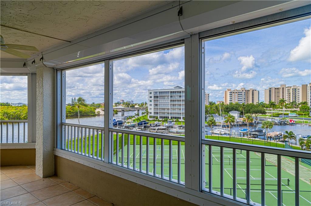 25 Bluebill Avenue, Unit 301 Naples, FL 34108 - Photo 9 of 41 a view of a city from a balcony