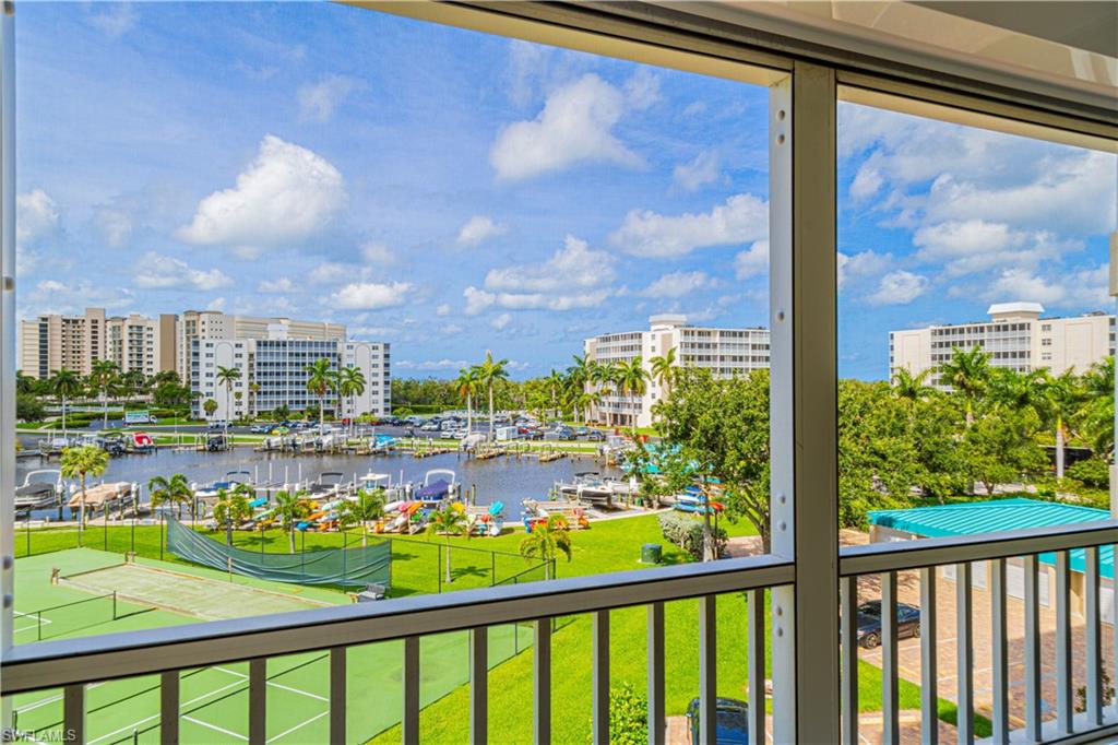 25 Bluebill Avenue, Unit 301 Naples, FL 34108 - Photo 10 of 41 a view of a city from a window