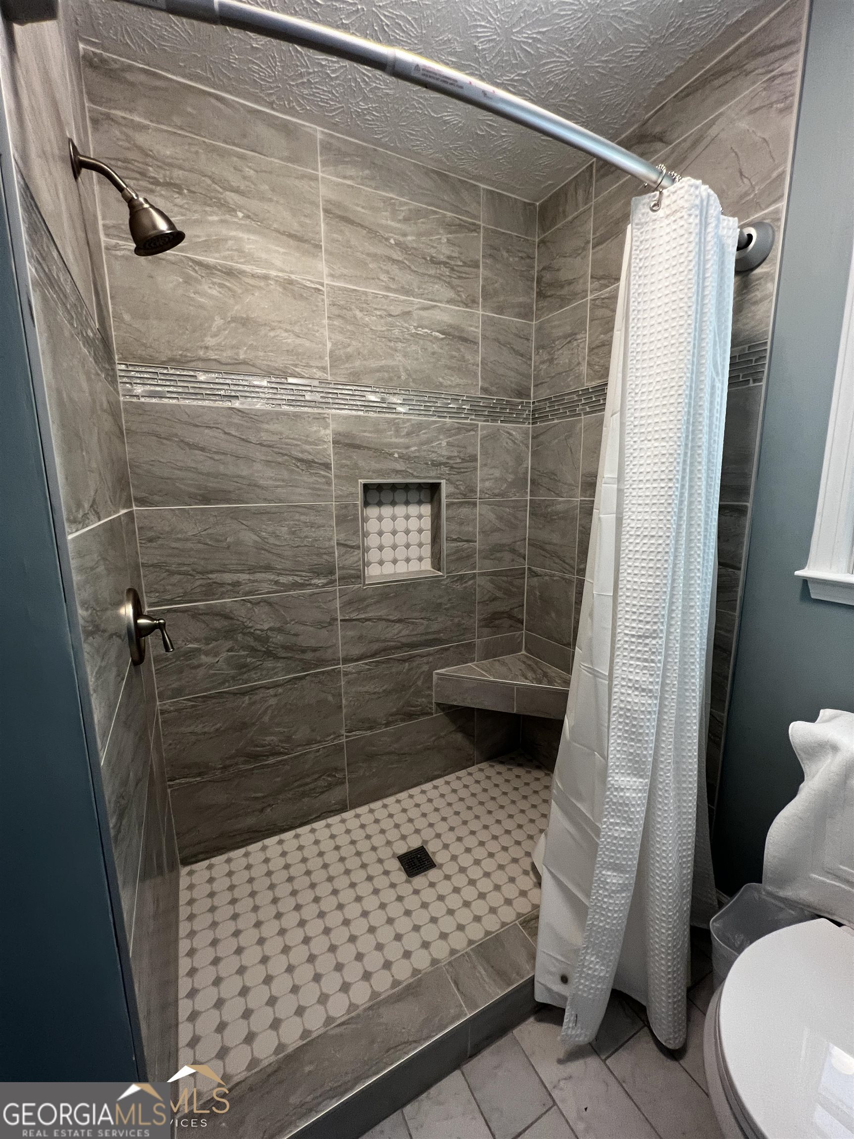 208 Swanson Ridge Peachtree City, GA 30269 - Photo 30 of 40 a bathroom with a sink toilet and shower