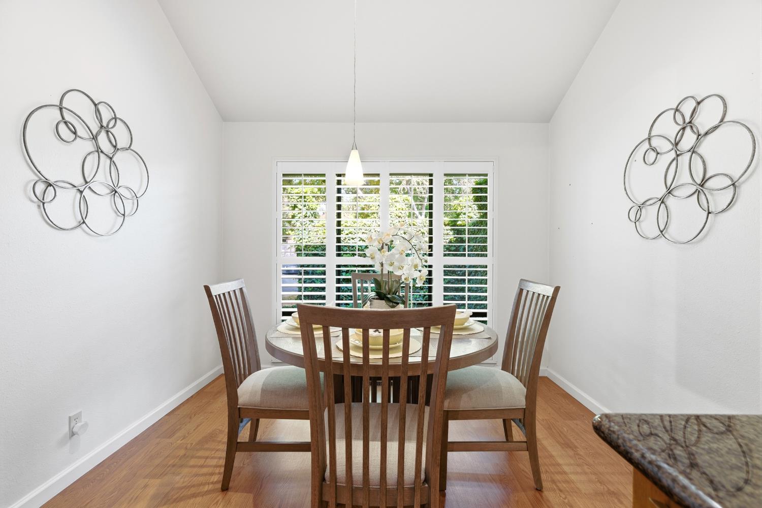 1833 Edgebrook Drive, Unit A Modesto, CA 95354 - Photo 22 of 43 a view of a dining room with furniture window and wooden floor