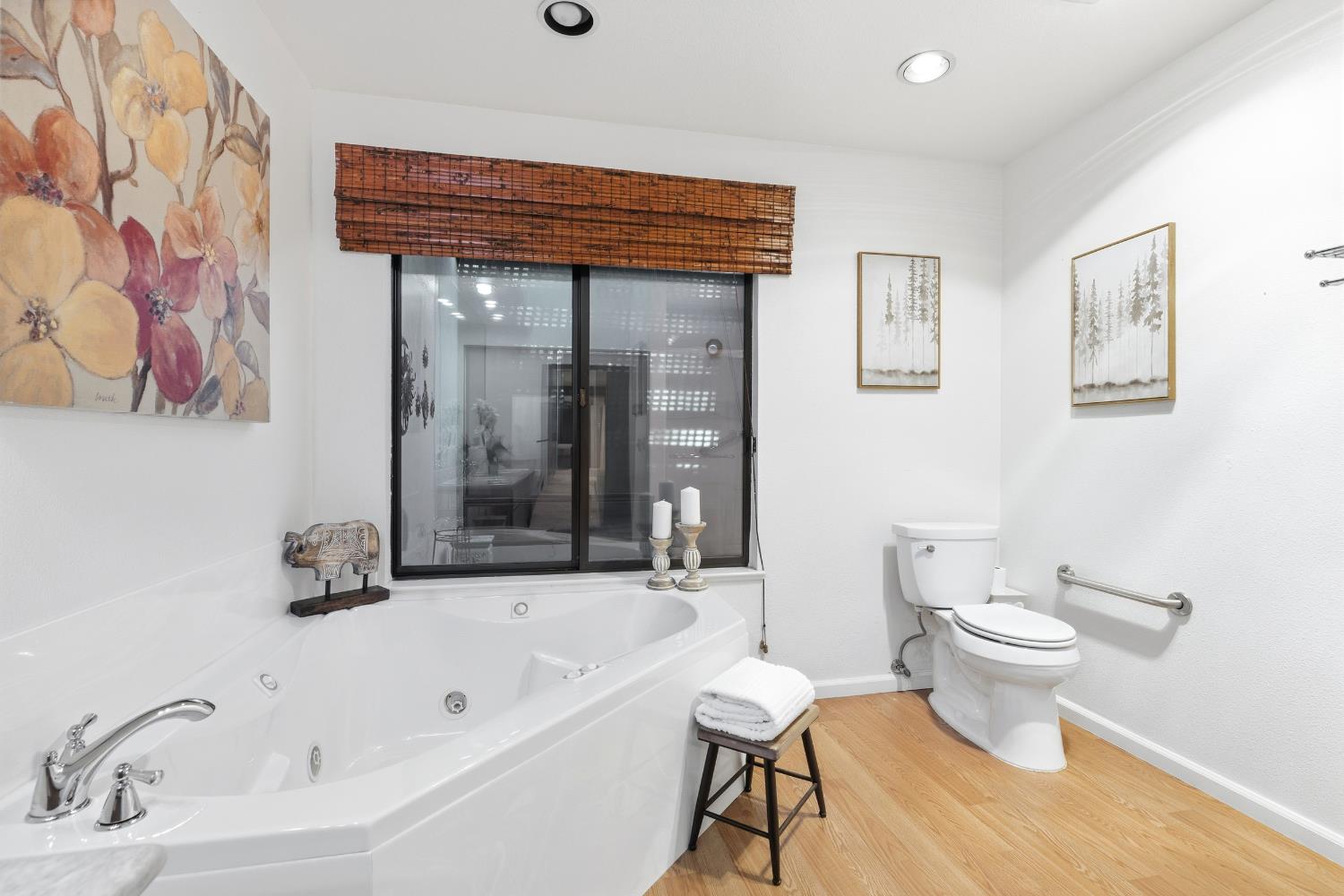1833 Edgebrook Drive, Unit A Modesto, CA 95354 - Photo 28 of 43 a bathroom with a bathtub and a toilet