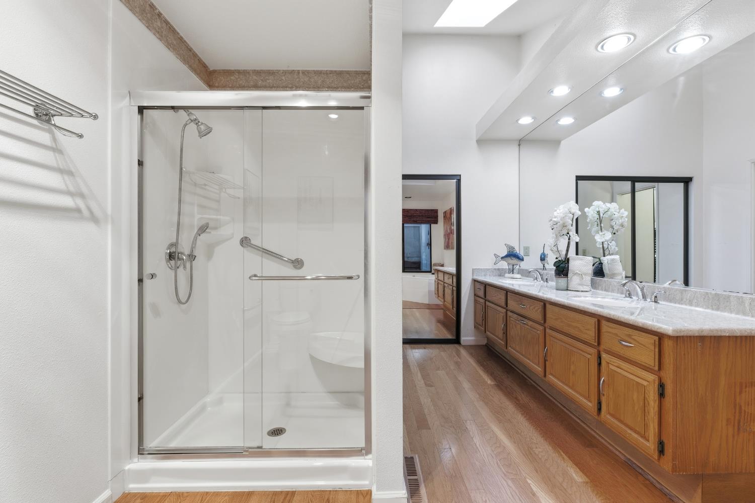 1833 Edgebrook Drive, Unit A Modesto, CA 95354 - Photo 29 of 43 a bathroom with a granite countertop sink mirror and shower
