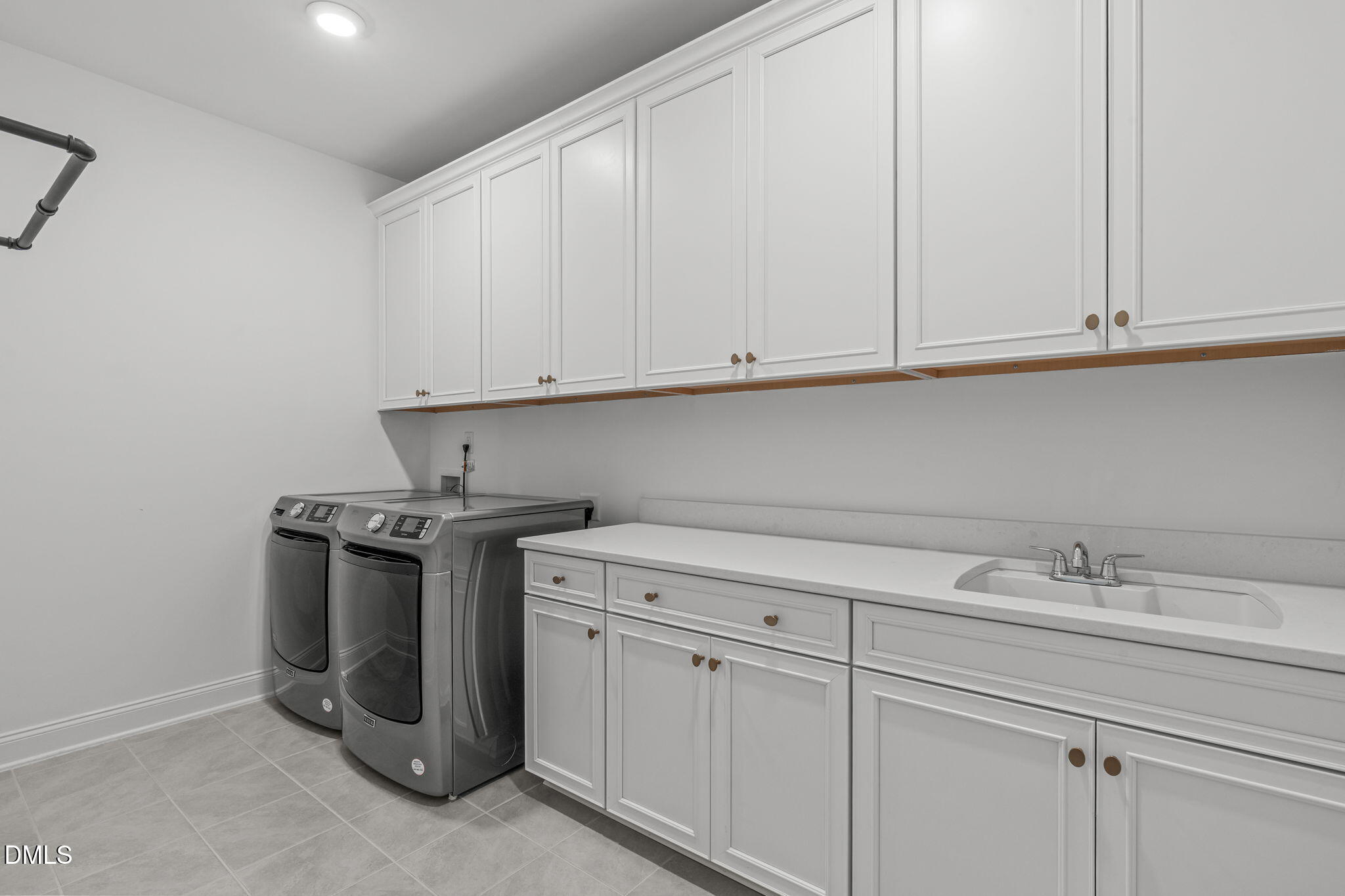 508 White Oak Pond Road Apex, NC 27523 - Photo 44 of 73 Laundry Room With Utility Sink