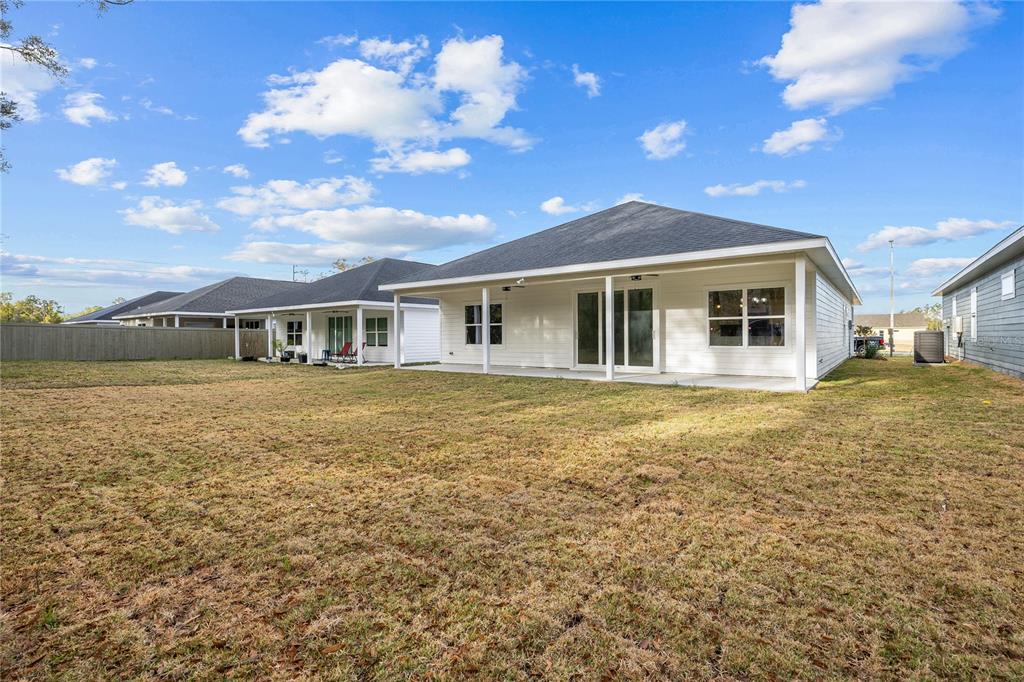 6682 Southwest 10th Lane Gainesville, FL 32607 - Photo 23 of 28 a front view of a house with a garden