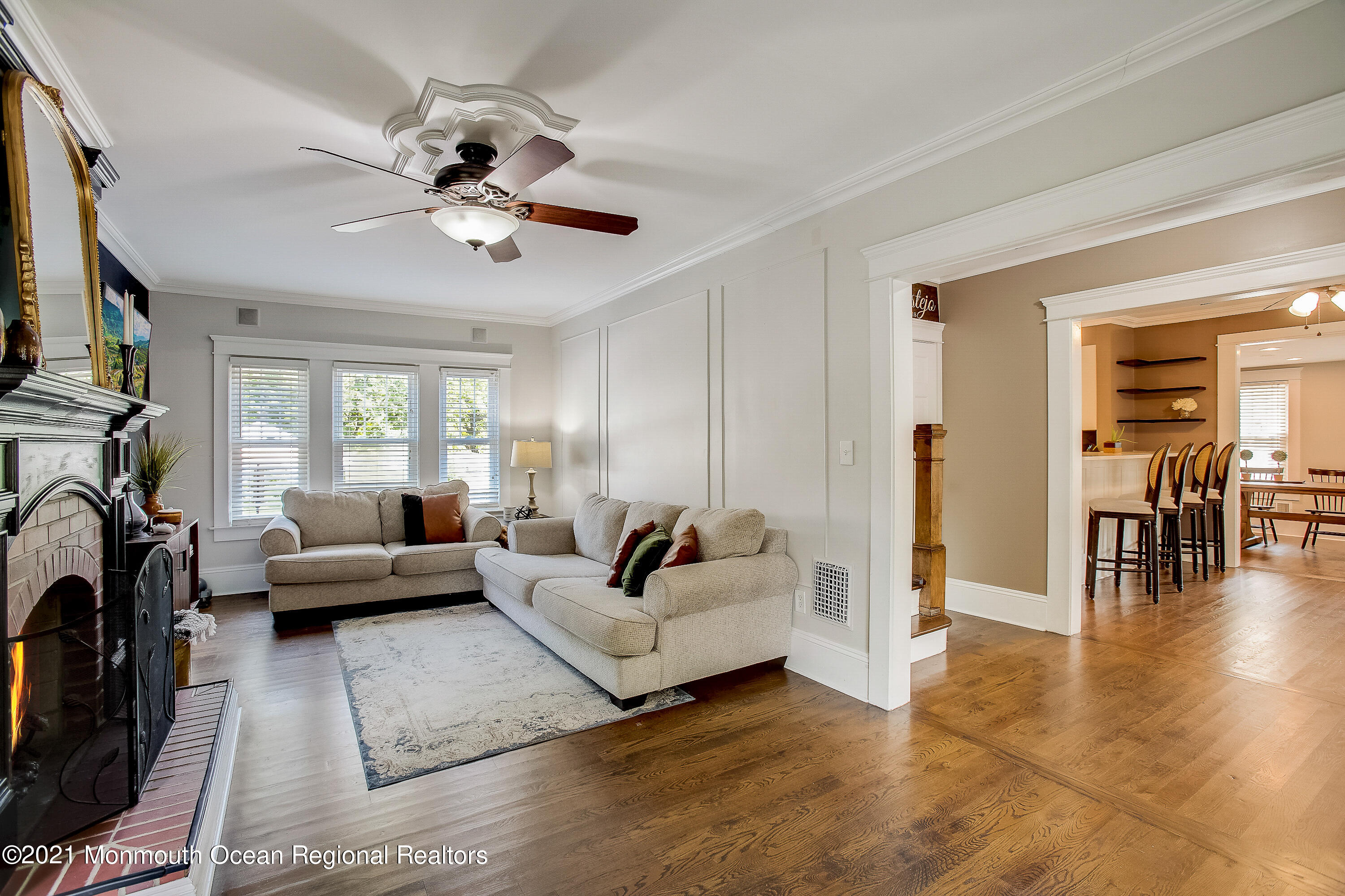 107 Brown Road Howell, NJ 07731 - Photo 14 of 43 a living room with furniture and a large window