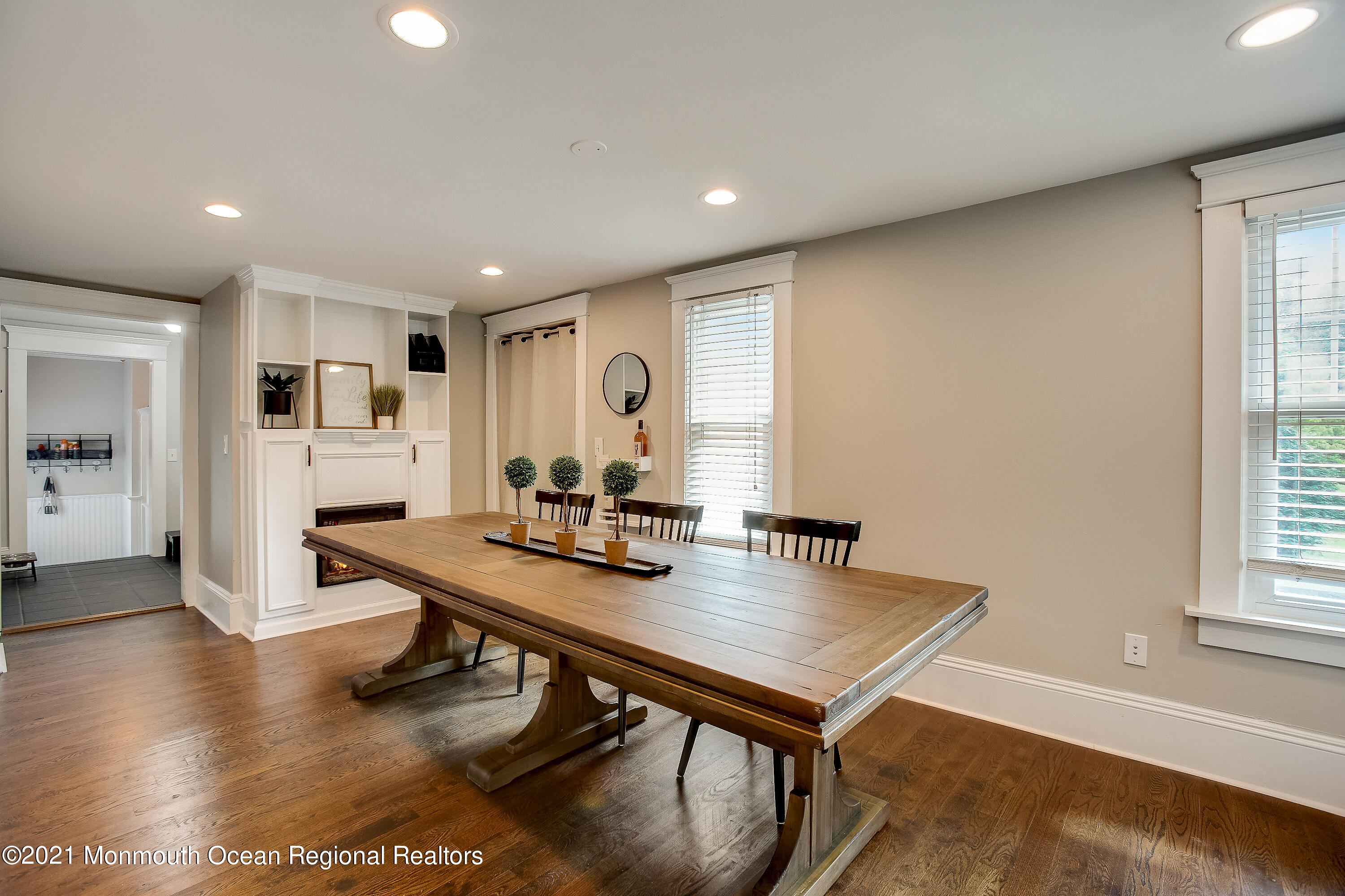 107 Brown Road Howell, NJ 07731 - Photo 15 of 43 a view of a workspace with furniture and wooden floor