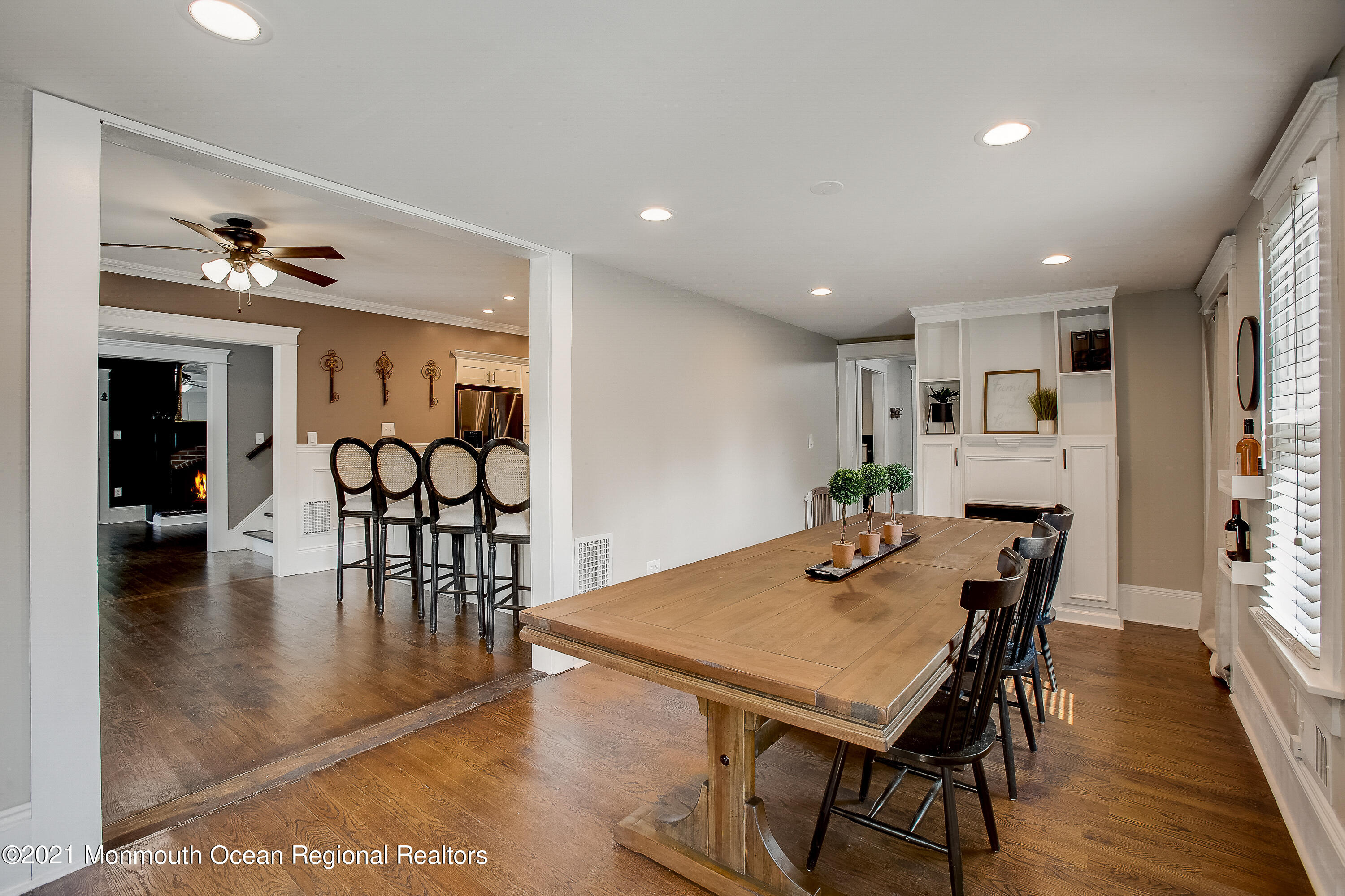 107 Brown Road Howell, NJ 07731 - Photo 16 of 43 a view of a dining room with furniture and wooden floor