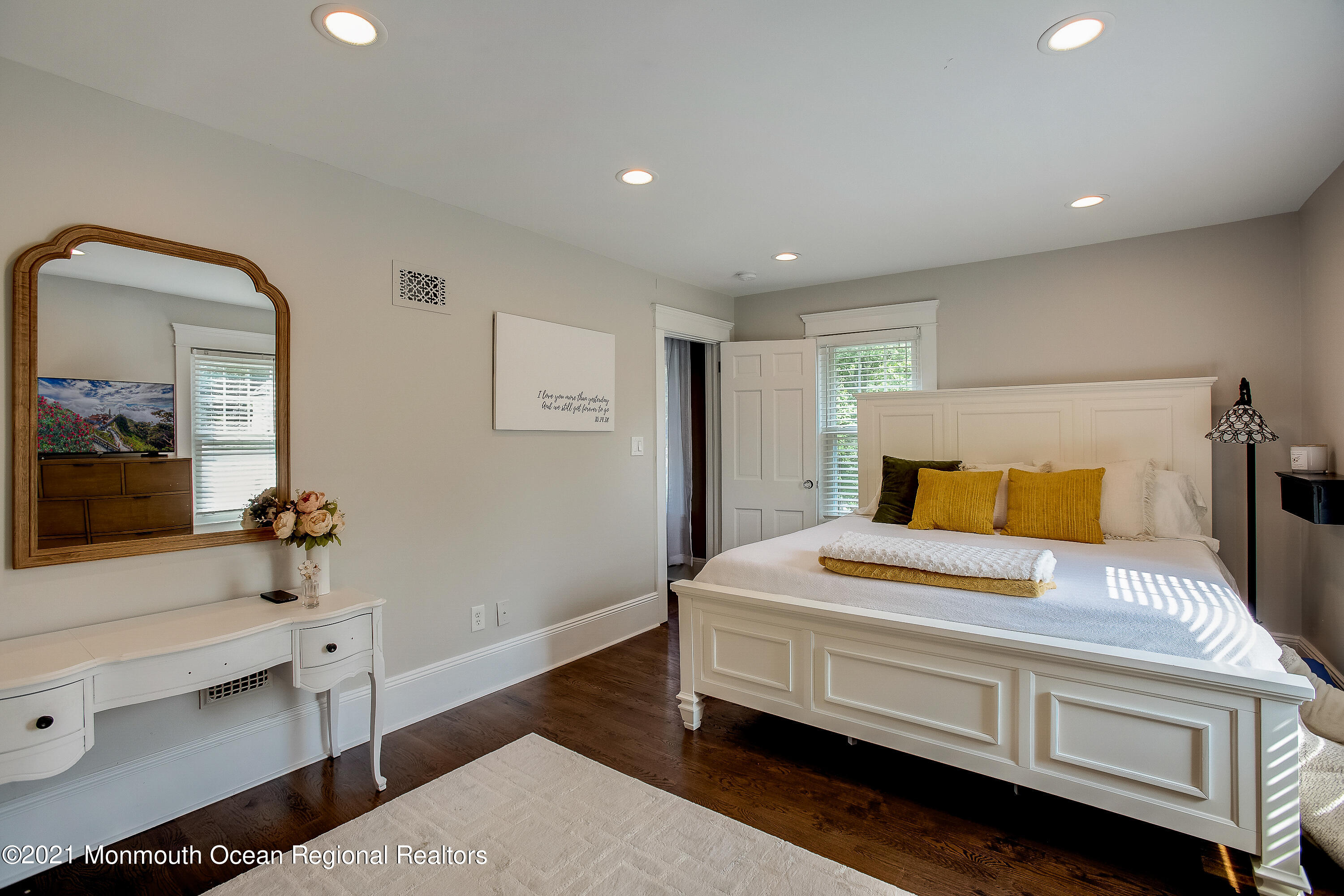 107 Brown Road Howell, NJ 07731 - Photo 20 of 43 a bedroom with a bed and a mirror