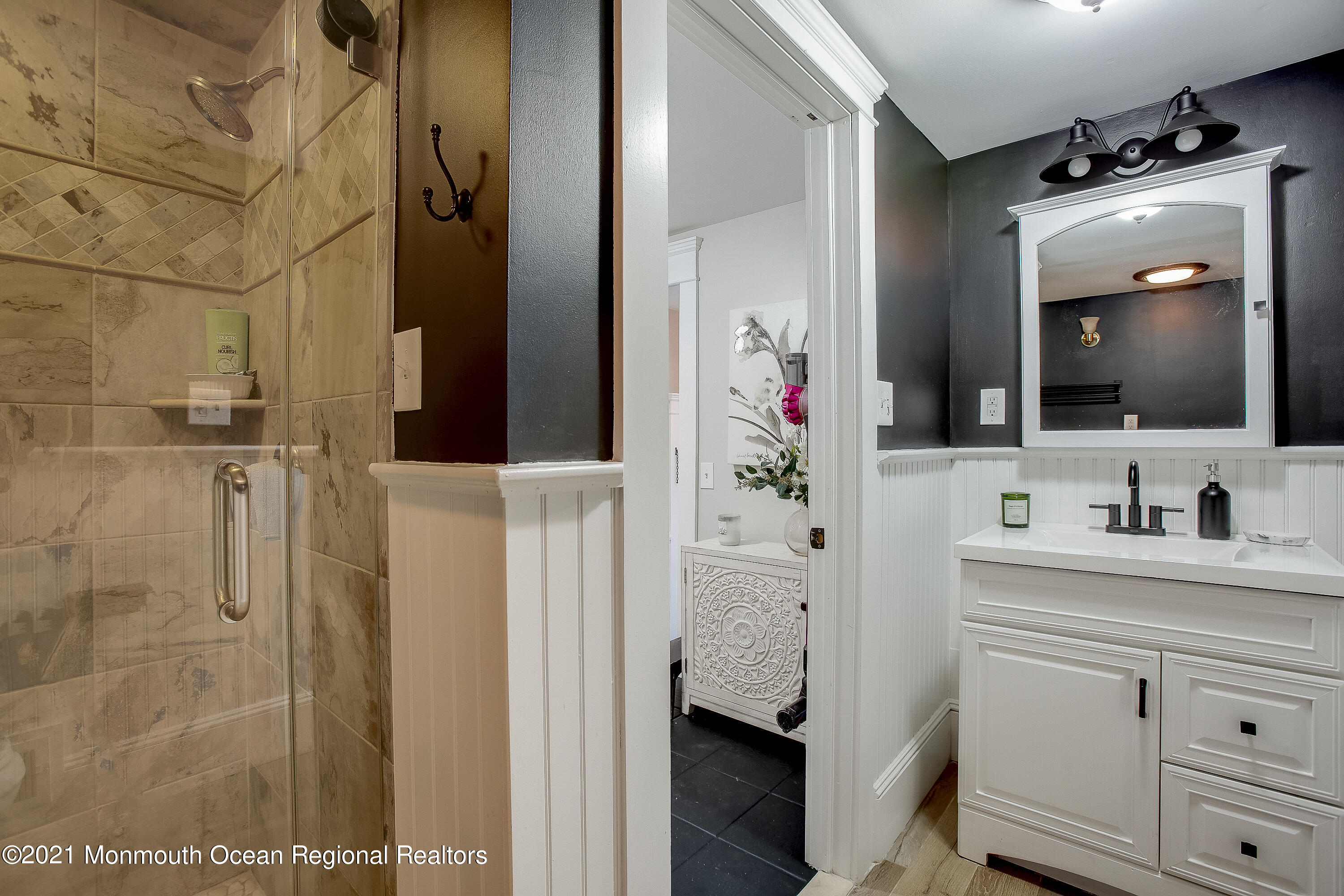 107 Brown Road Howell, NJ 07731 - Photo 27 of 43 a bathroom with a sink and a mirror