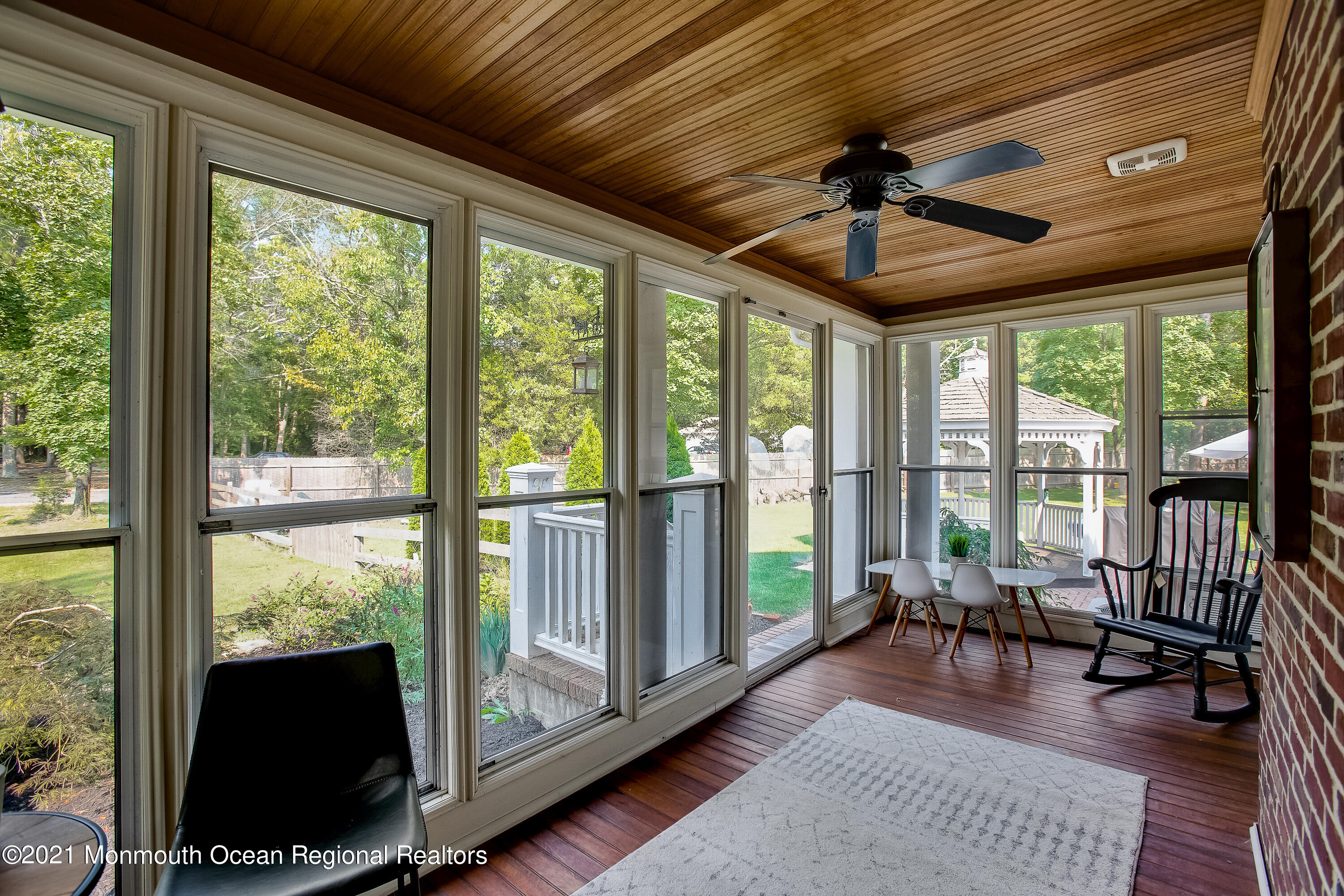 107 Brown Road Howell, NJ 07731 - Photo 29 of 43 a living room with hardwood floor and large windows
