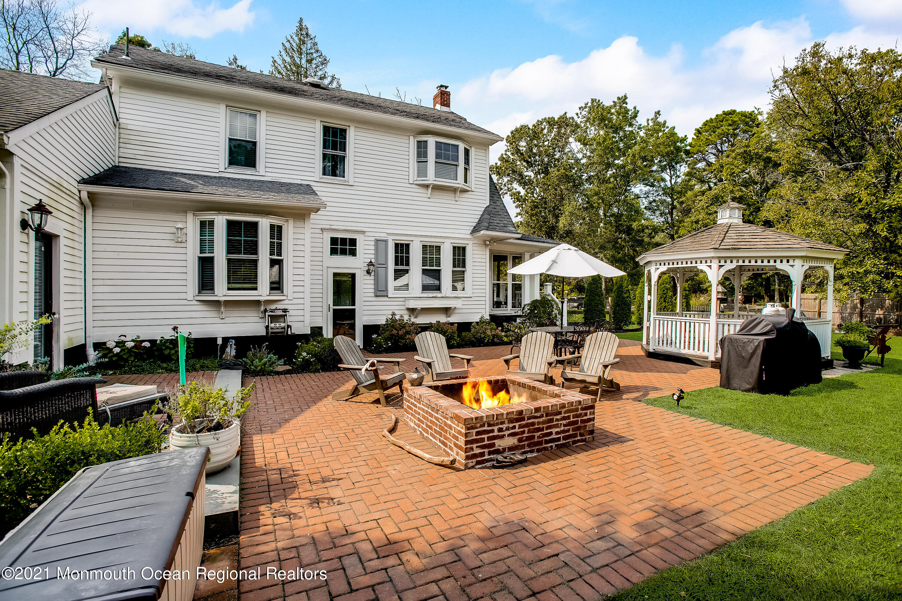 107 Brown Road Howell, NJ 07731 - Photo 31 of 43 a view of a house with swimming pool and sitting area