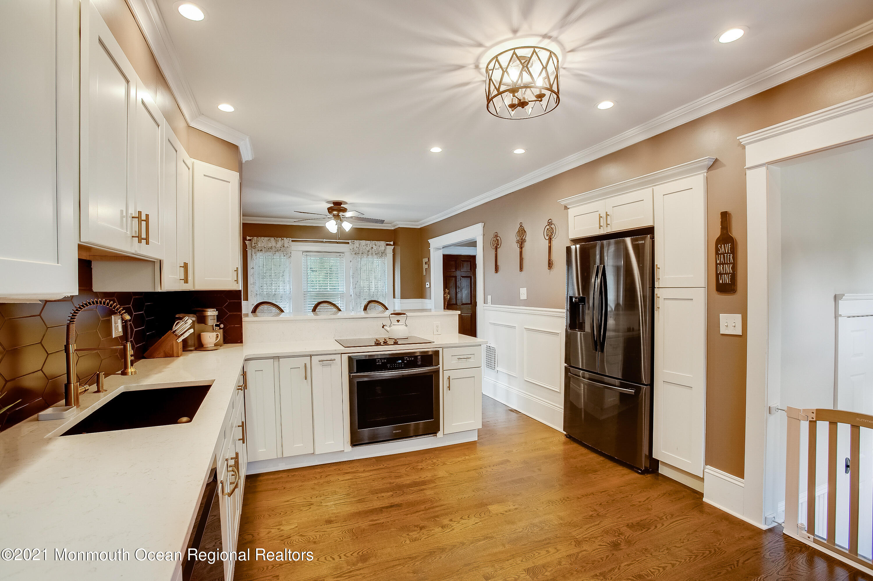 107 Brown Road Howell, NJ 07731 - Photo 7 of 43 a kitchen with stainless steel appliances granite countertop a refrigerator a stove and a refrigerator