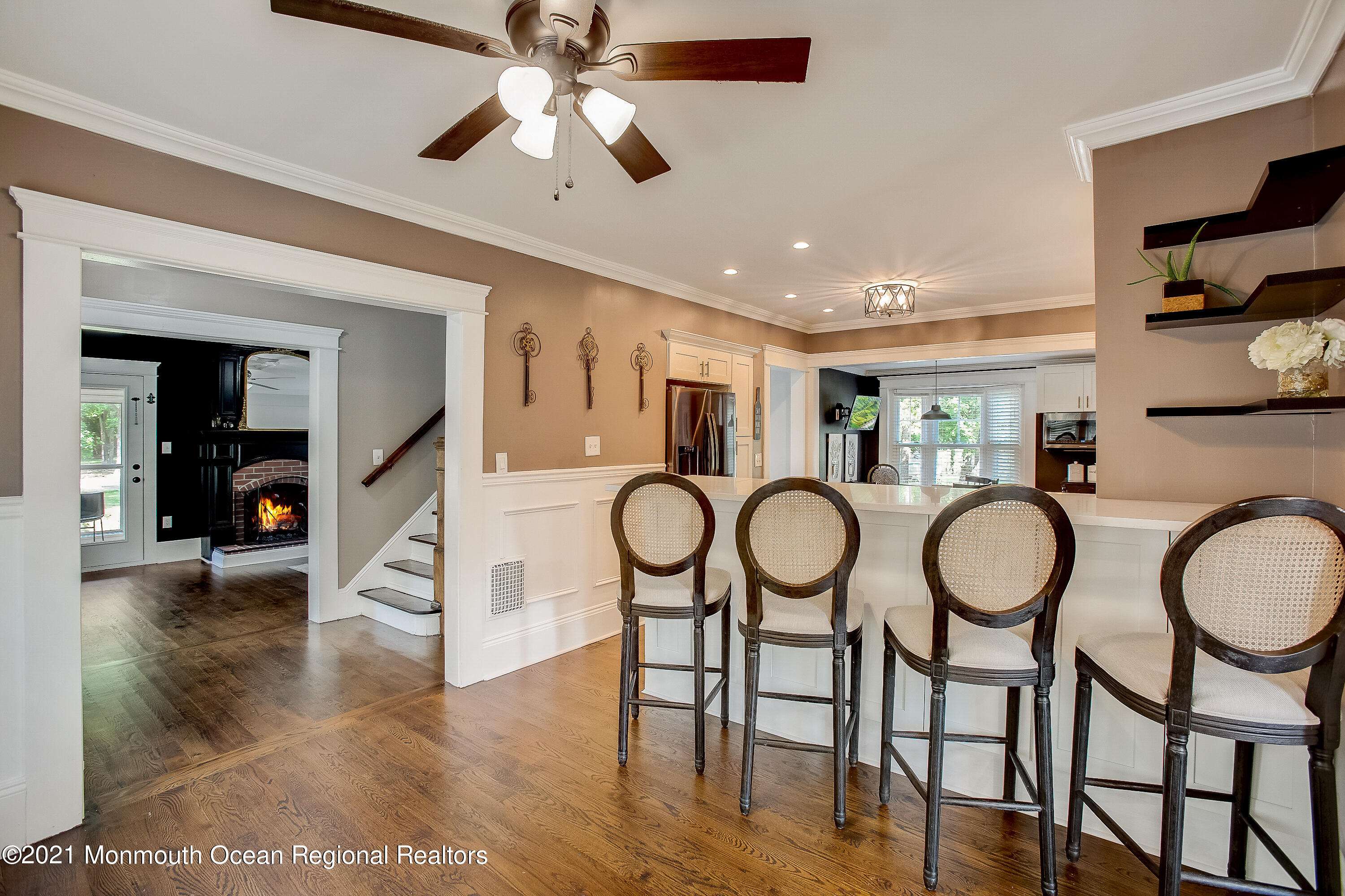 107 Brown Road Howell, NJ 07731 - Photo 10 of 43 a very nice looking dining room with a large window and chandelier