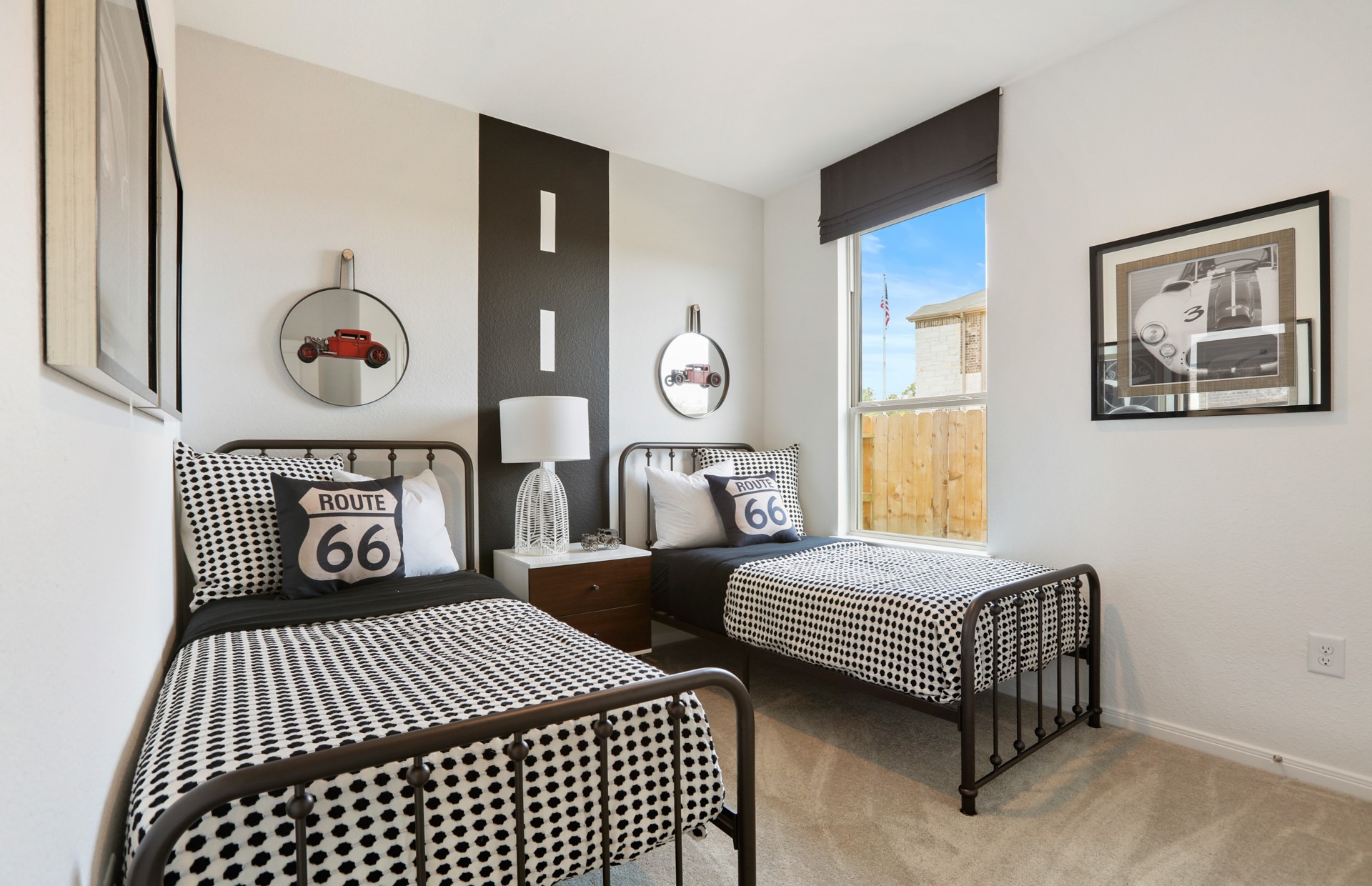 16145 Sepia Manor Street Conroe, TX 77302 - Photo 24 of 36 a bedroom with two bed and a window