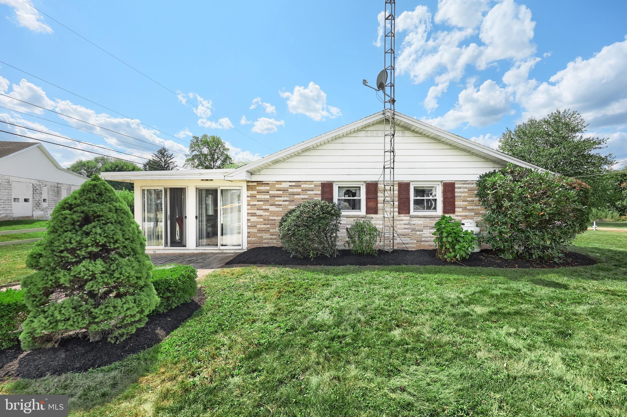 181 Harrisburg Street York Springs, PA 17372 - Photo 11 of 44 a front view of a house with a yard