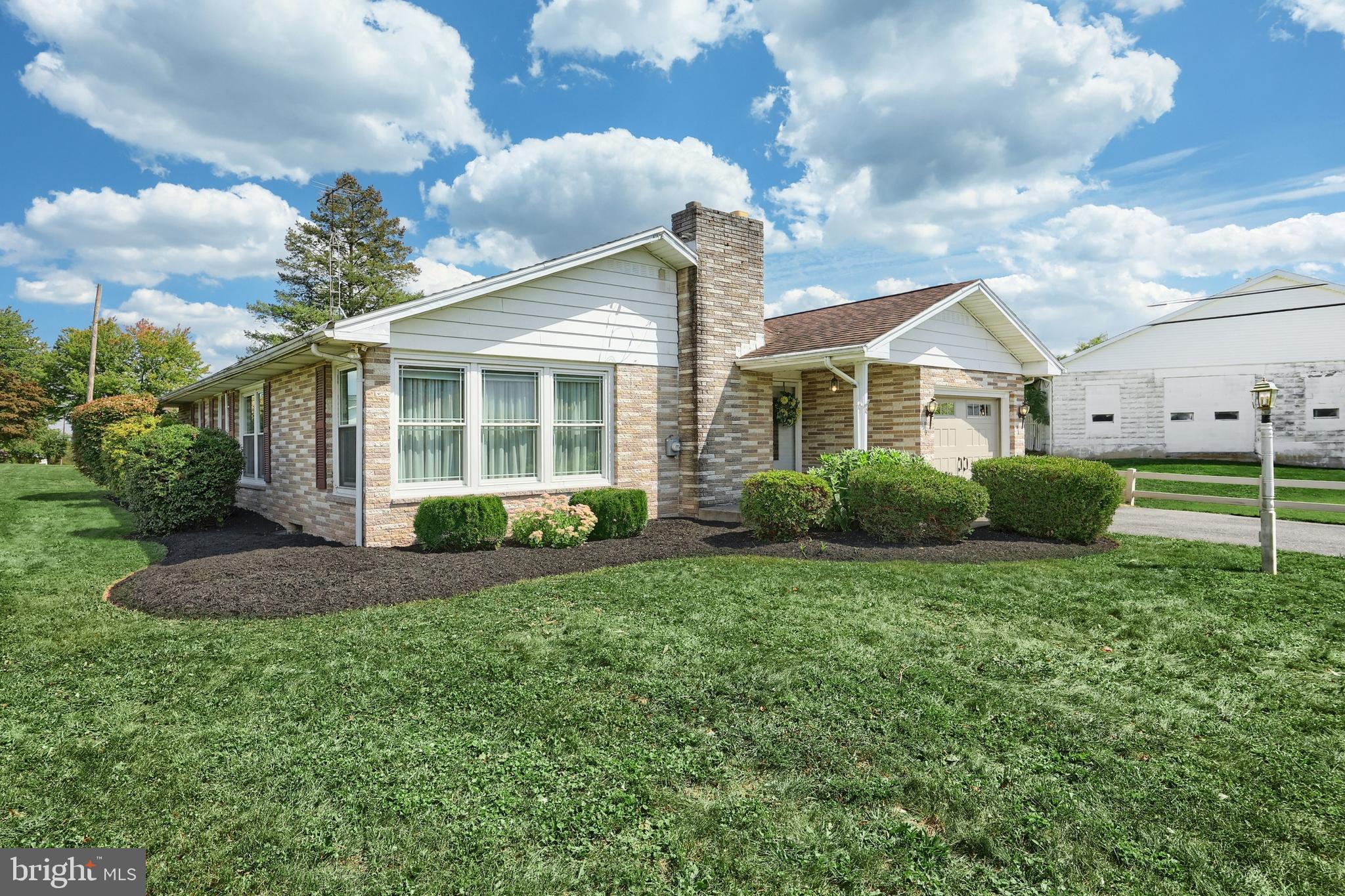 181 Harrisburg Street York Springs, PA 17372 - Photo 2 of 44 a view of a house with backyard and garden