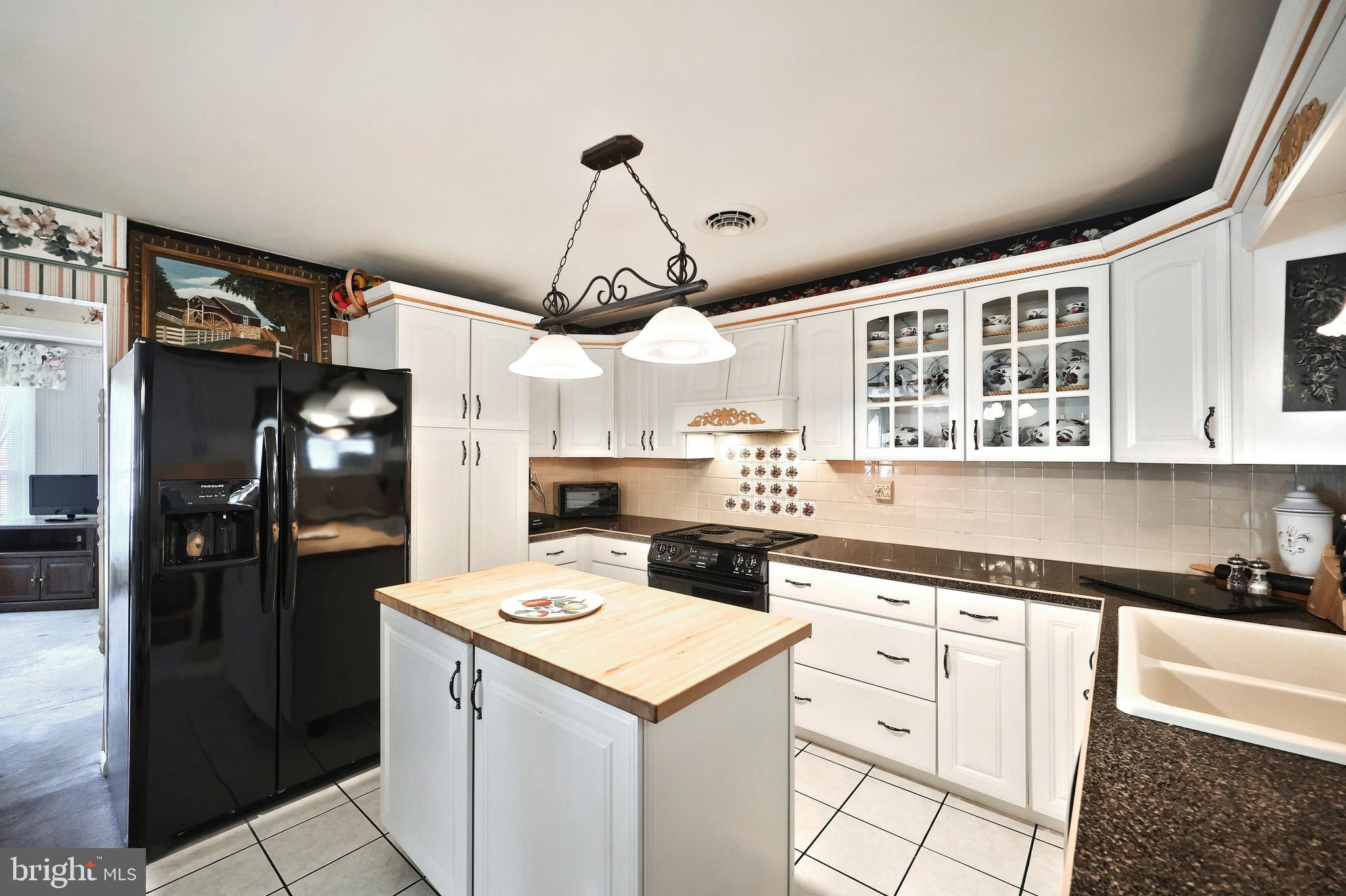 181 Harrisburg Street York Springs, PA 17372 - Photo 23 of 44 a kitchen that has a lot of white cabinets and stainless steel appliances